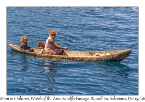 Woman & Children in Canoe