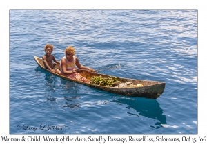 Woman & Children in Canoe
