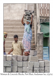 Woman & Concrete Blocks