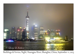 Buildings & Ferry at Night