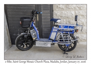2026-01-27#4840 e-Bike, St George Mosaic Church Plaza, Madaba, Jordan